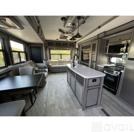 A modern kitchen and dining area in a houseboat.