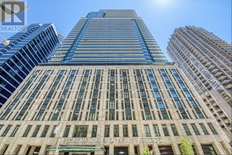 A tall building with the words "Dream Home Realty Inc." on it.
