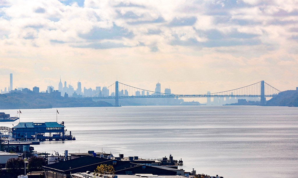 a view and the coronado bridge over the water