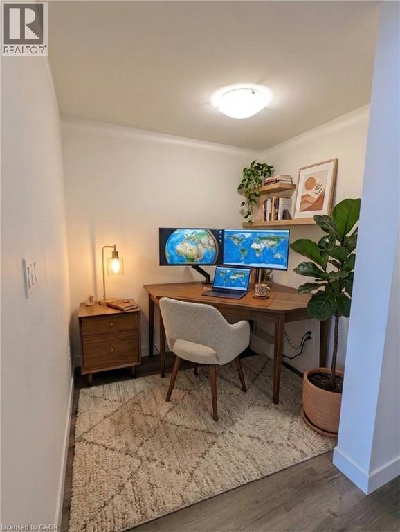A small room with a desk and a chair.