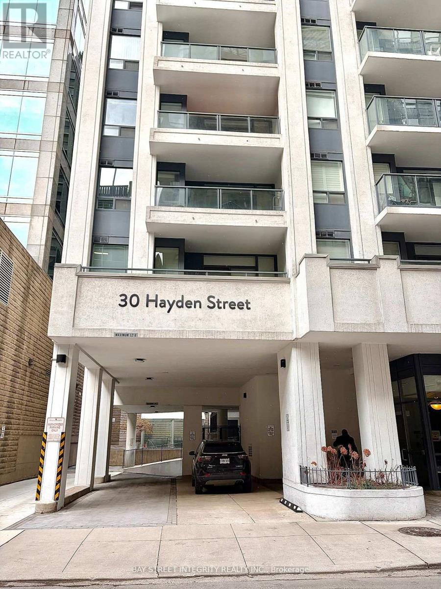 A building with the sign 30 Hayden Street is shown.