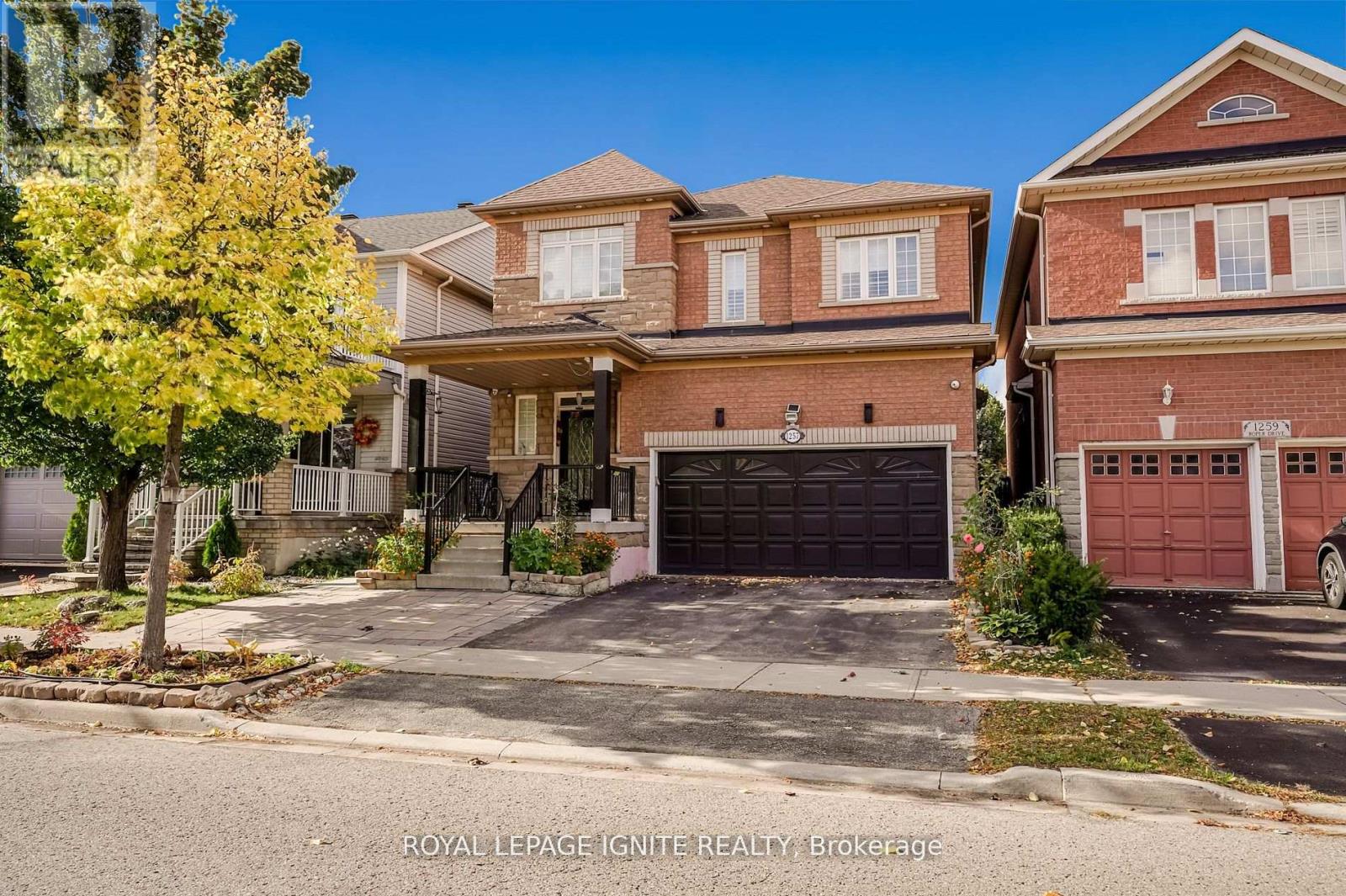 A house with a garage is for sale by Royal LePage Ignite Realty Brokerage.
