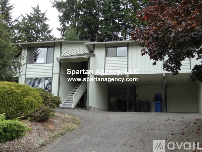 A building with the name "Spartan Agency, LLC" on it.