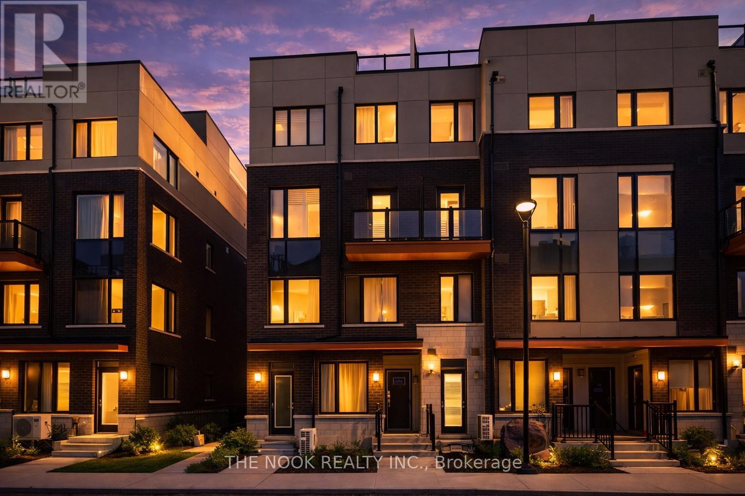 A building with the text "The Nook Realty Inc., Brokerage" in front of it.