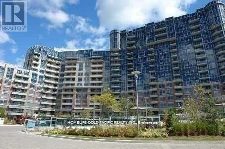 A large building with a glass facade is under construction.