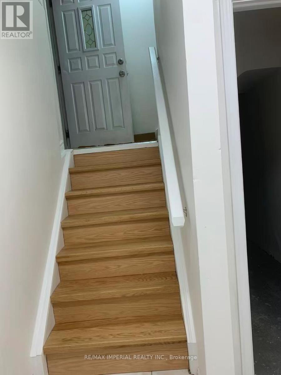A set of stairs leading to a door.