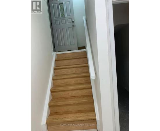 A set of stairs leading to a door.