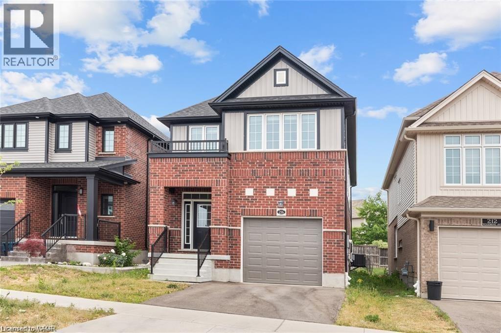 A house with a garage is for sale.