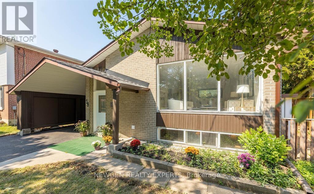 A house with a brown garage door and a white door.