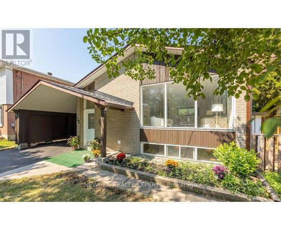 A house with a brown garage door and a white door.