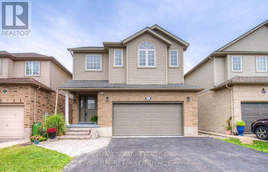 A house with a realtor logo in the corner.