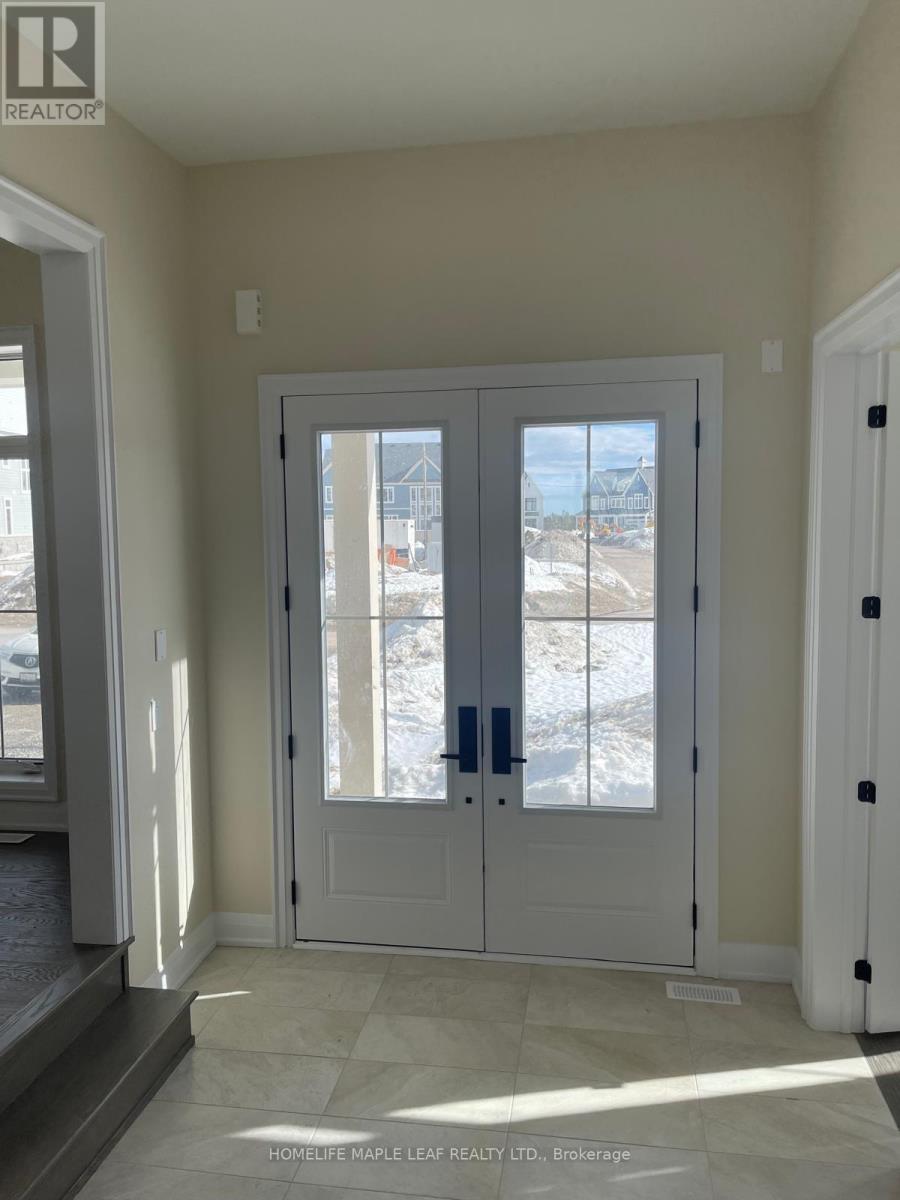 A white double door with a glass window in the middle.