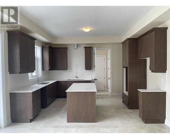 A kitchen with brown cabinets and a white countertop.