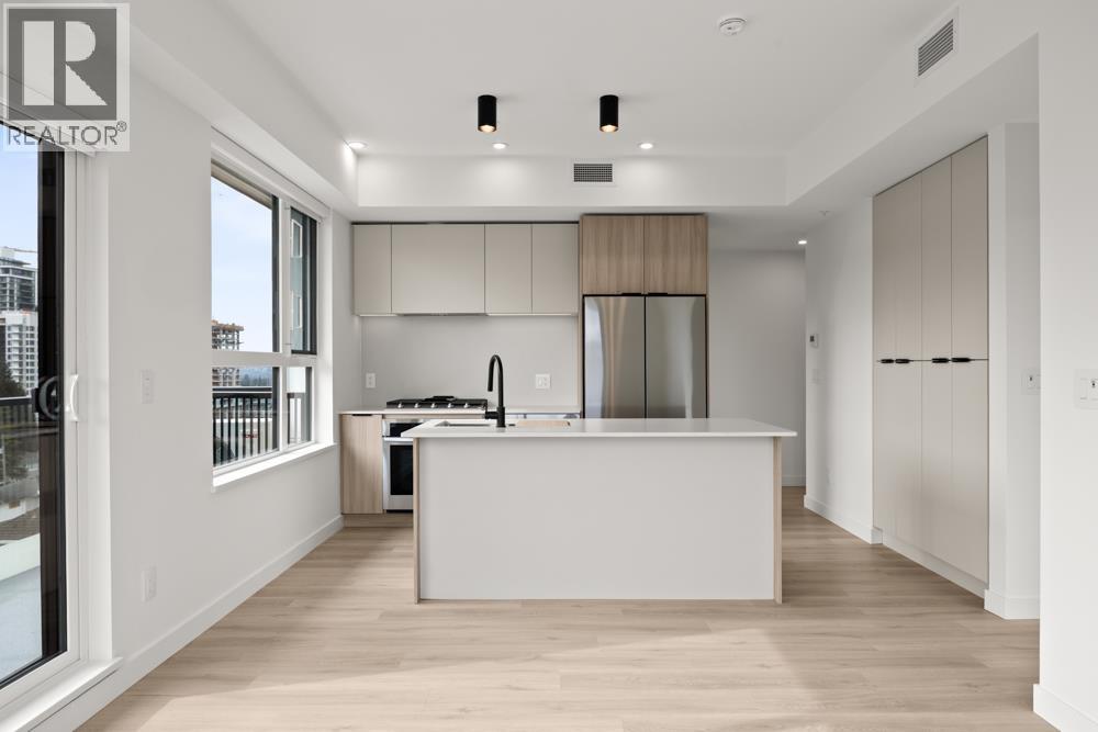 A realtor's office with a large window overlooking the city.