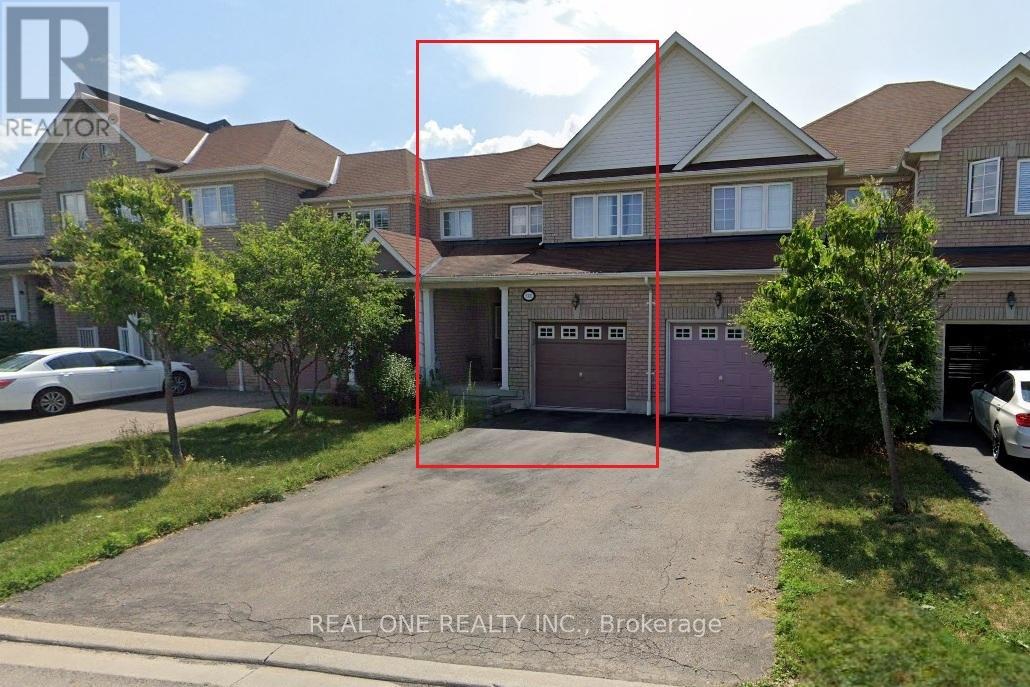 A house with a red rectangle drawn on it and a car parked in front.