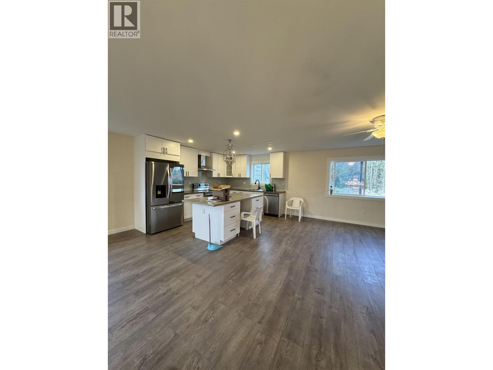 A realtor logo is on the top left corner of the image.