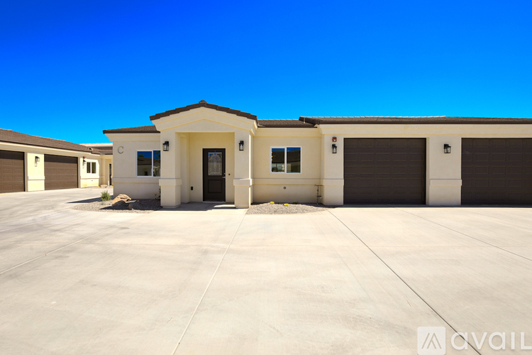 A two-story house with a garage is available for rent.