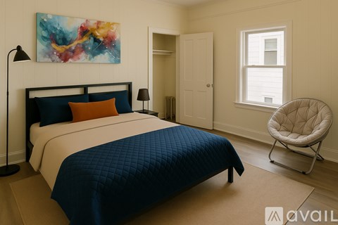 A bedroom with a large bed and a colorful painting on the wall.