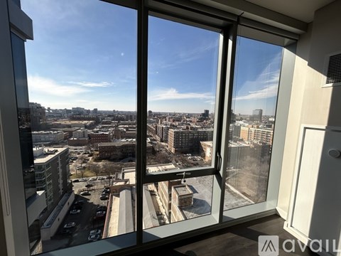 A view of a cityscape from a high-rise building.