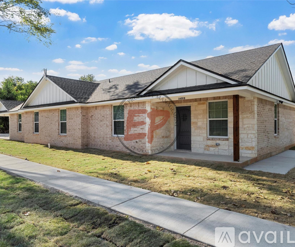 A house with a sign that says "available" in front of it.