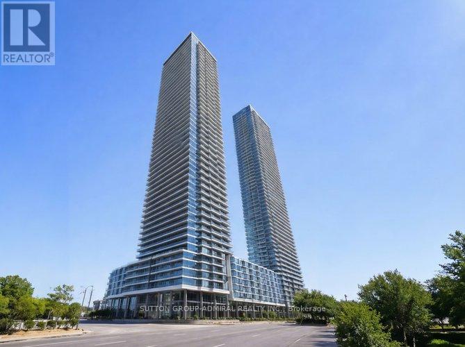 Two tall buildings with the text "REALTOR" on the top left corner.