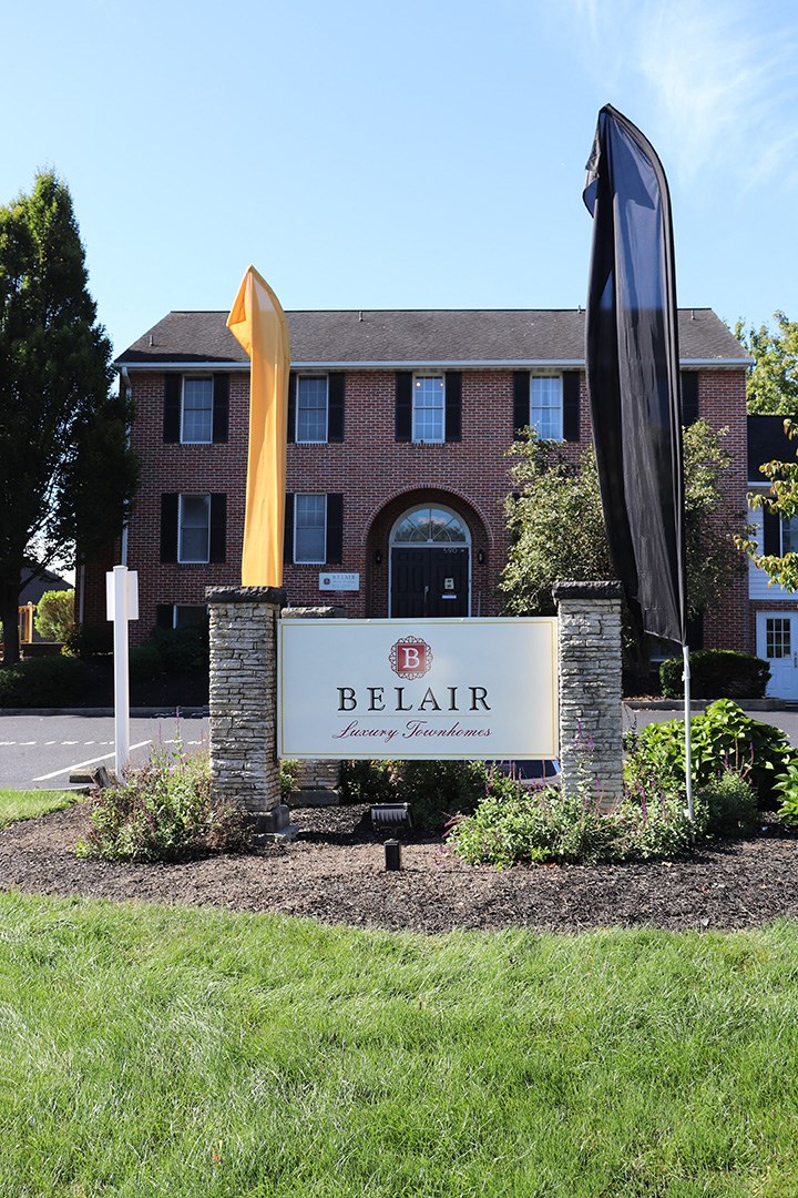 the sign in front of the belair office building