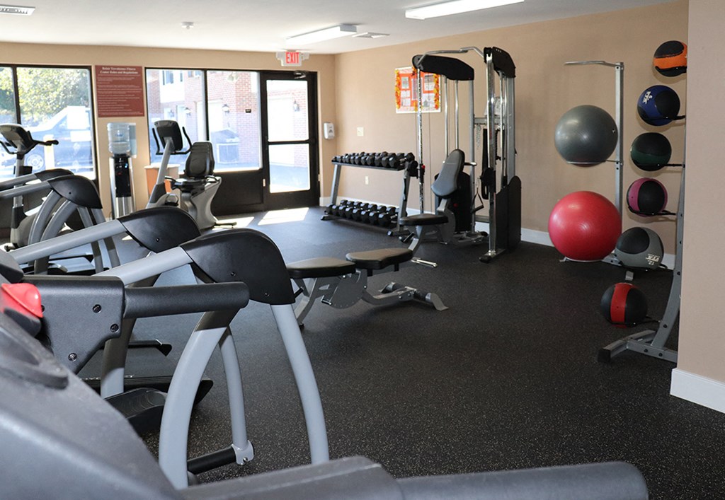 a gym with weights and other exercise equipment