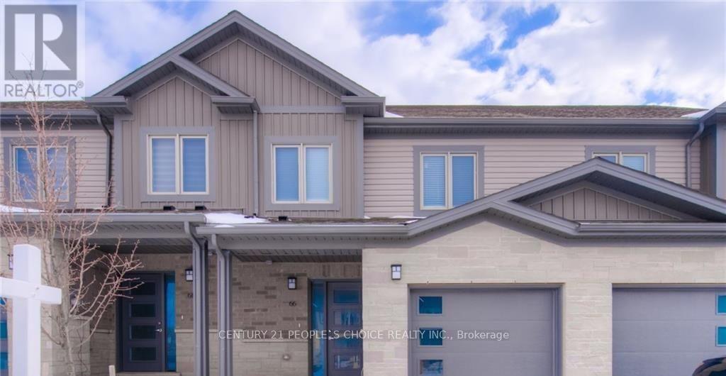 A house with a sign that says Century 21 People's Choice Realty, Brokersage.