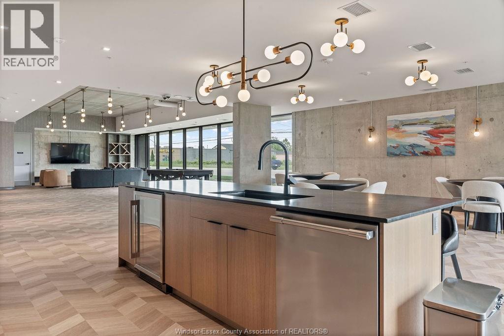 A modern kitchen with wooden cabinets and a large island.