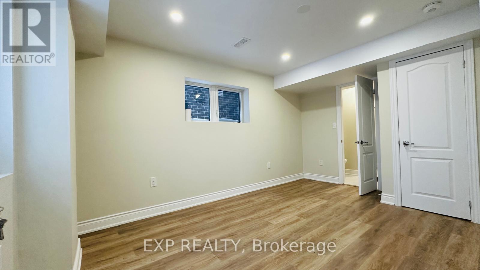 A room with EXP REALTY, Brokerage watermark on the floor.