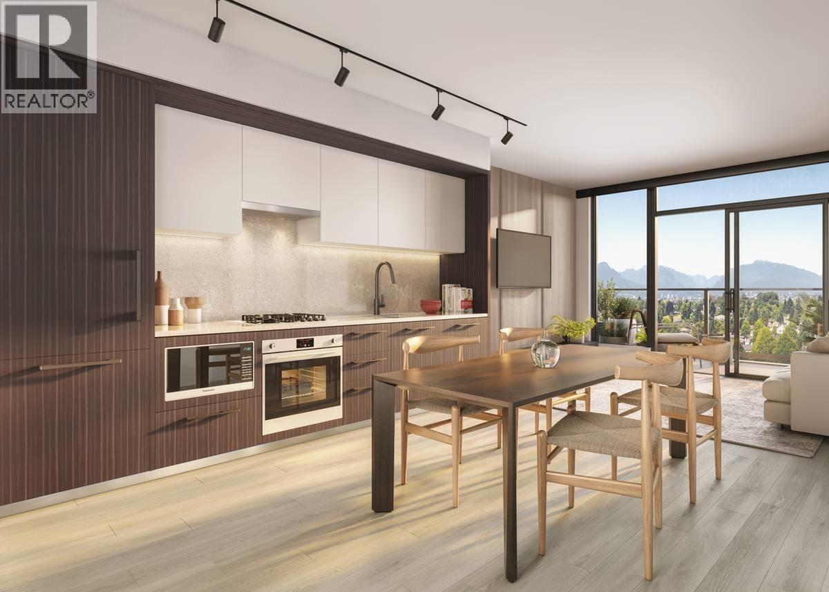 A modern kitchen with a dining table and chairs.