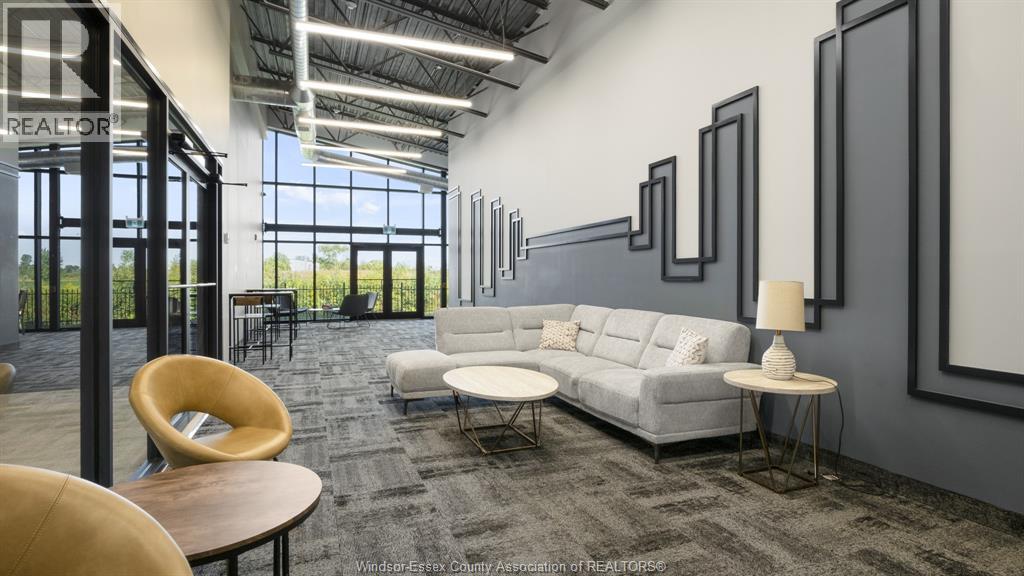 A realtor's office with a large window and a view of the outdoors.