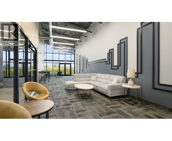 A realtor's office with a large window and a view of the outdoors.
