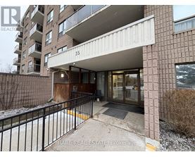 The entrance to a building with a sign that reads "RARE REAL ESTATE Brokerage".