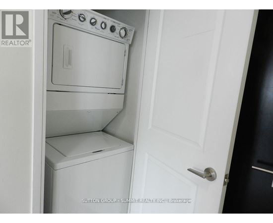 A white oven and dishwasher are installed in a kitchen.