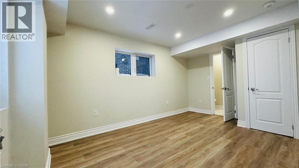 A room with a white door and a window with a white frame.
