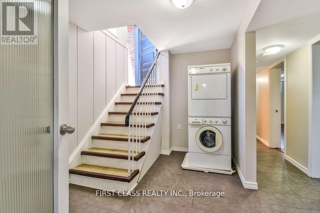 A realtor photo of a laundry room with a washer and dryer.