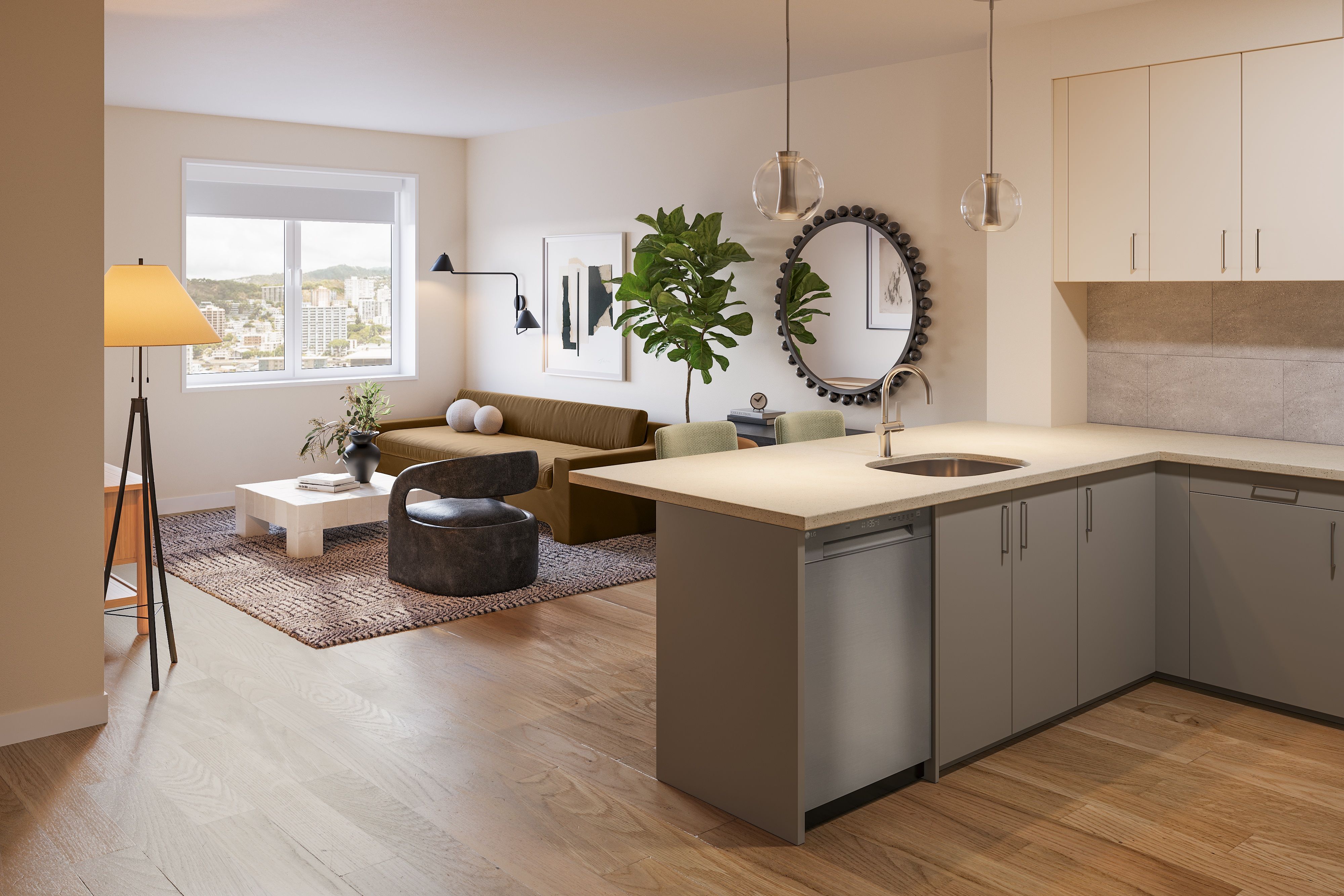 A modern kitchen with a large island and a living area with a couch and chair.