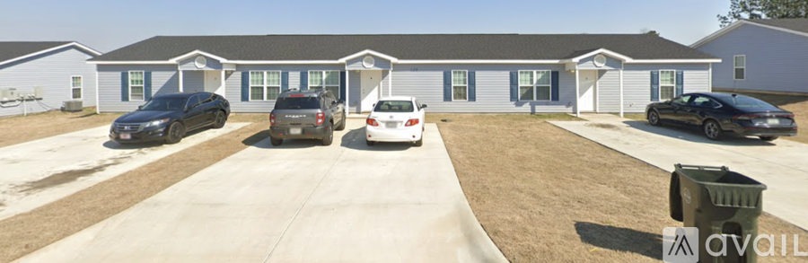 A car is parked in front of a house.