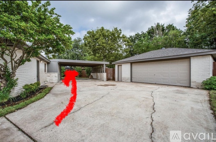 A red arrow is pointing to the left in front of a house.
