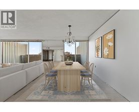 A dining room with a wooden table and chairs.