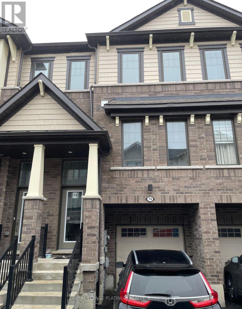 A car is parked in front of a house.
