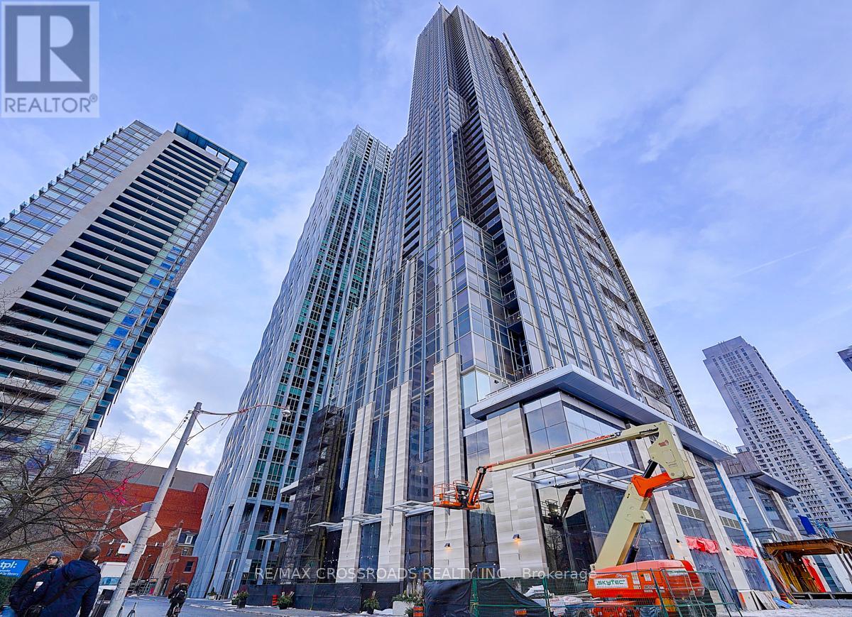 A construction site with a tall building under construction.