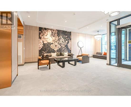 A modern living room with a large floral wallpaper and a variety of seating options.
