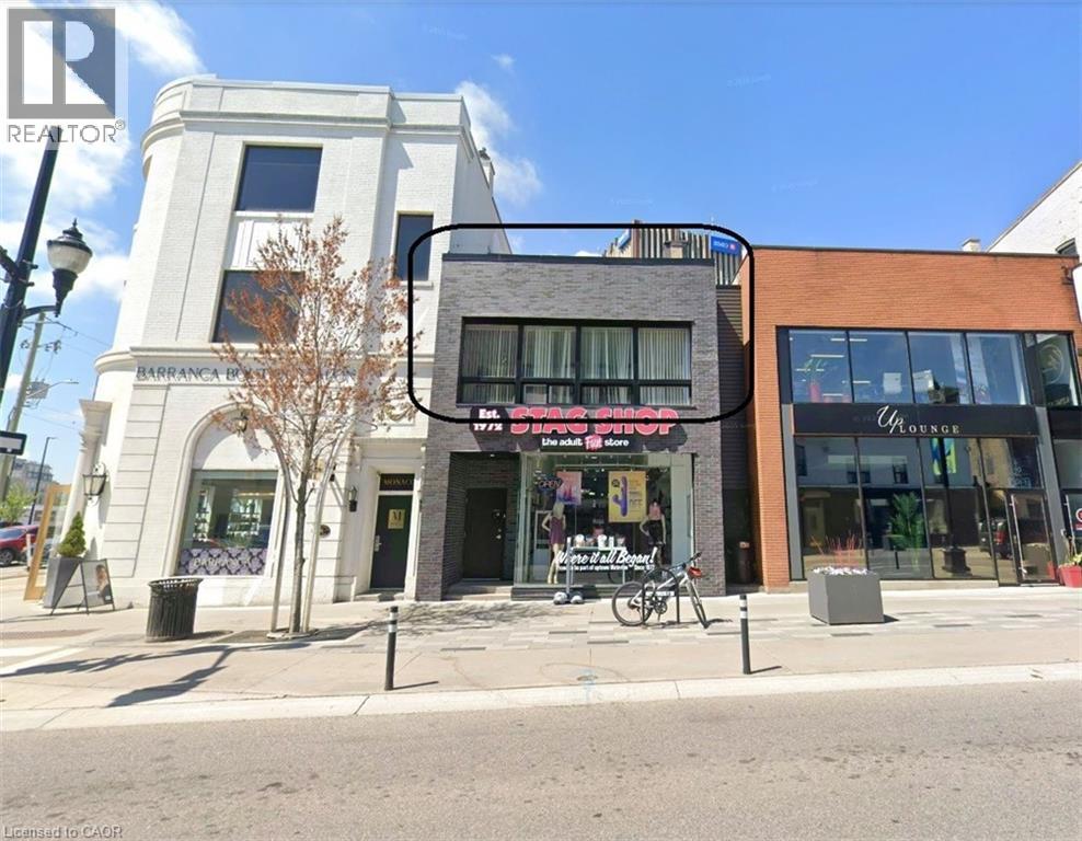 A street view of a building with a sign that says "BARRANCA DEL PUEBLO".