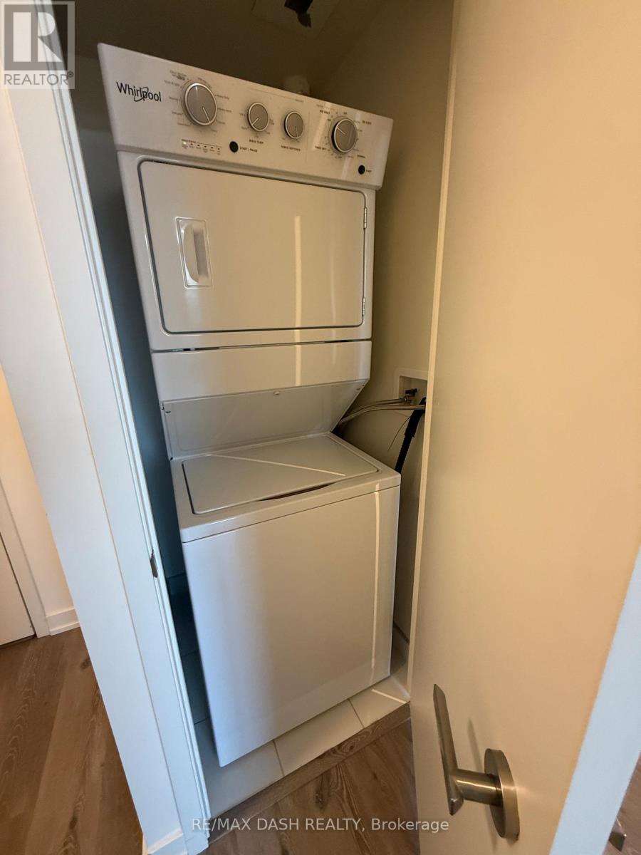 A white Whirlpool oven and microwave are installed in a kitchen.