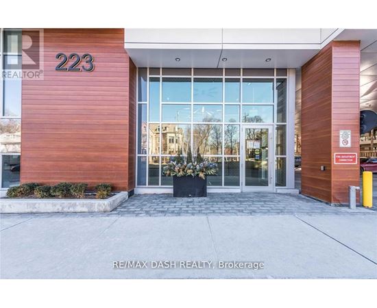 The front of a building with the number 223 on it.