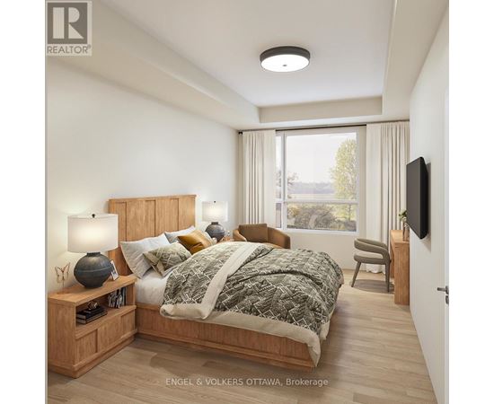 A bedroom with a bed, nightstand, and chair.