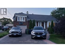Two cars are parked in front of a house with the text "ROYAL LEPAGE IGNITE REALTY, Brokerage" on the image.