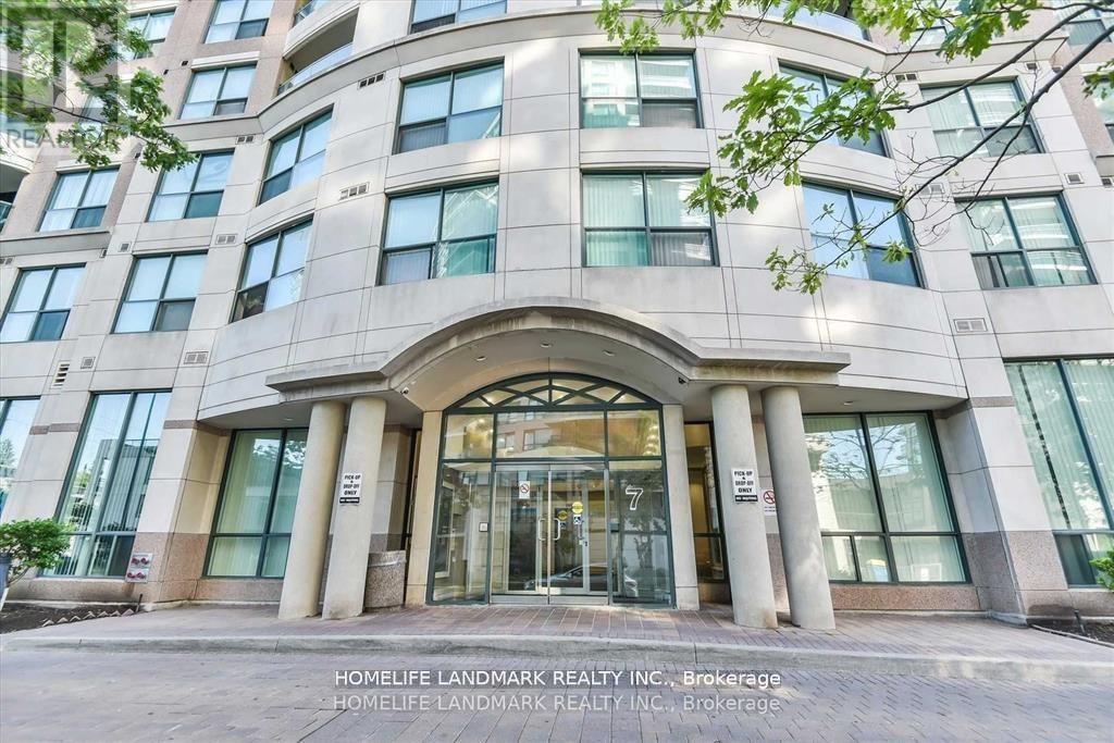 The front of a building with the sign "HOMELIFE LANDMARK REALTY INC., Brokerage" on it.